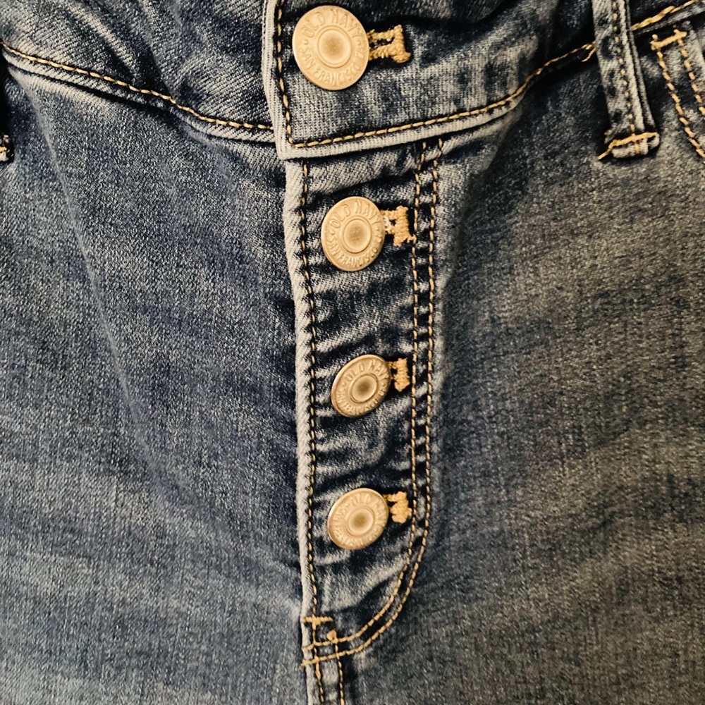 Two pair button fly high waist skinny jean